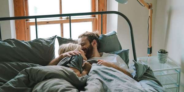 couple home bed