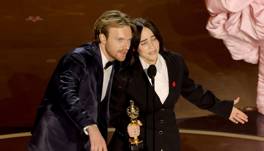 Billie Eilish and Finneas O’Connell accept Best Original Song award at the 2024 Oscars